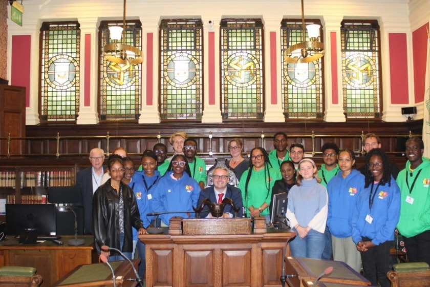 The visiting students in the House of Keys Chamber with Speaker, Juan Watterson SHK